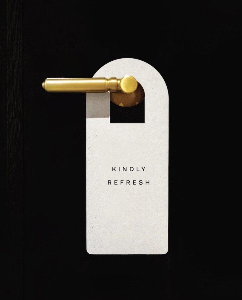 Caffeinated Socials door hanger reading Kindly refresh