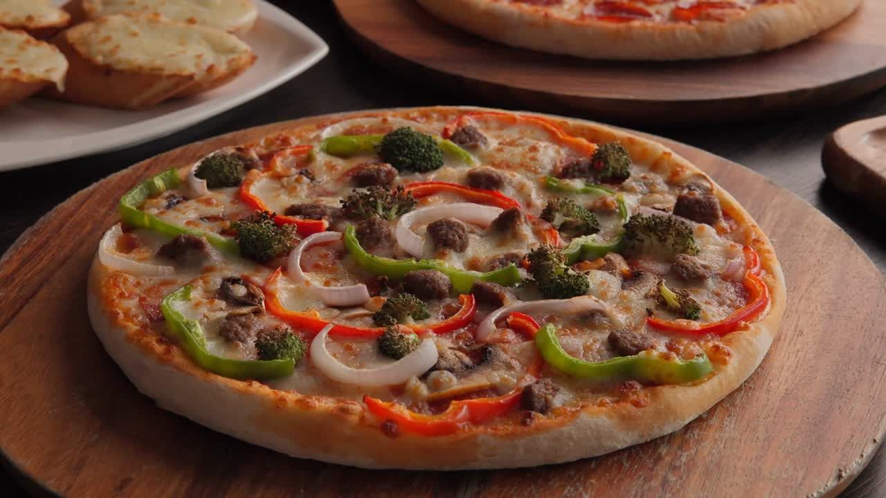 A Pizza Pie Factory pizza on a wooden board